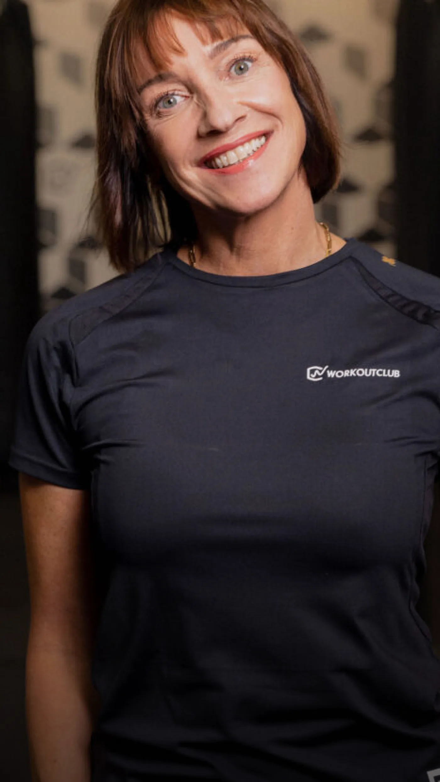 Trainer van de Workoutclub in de zaal